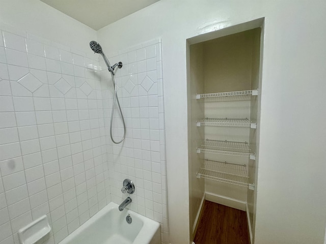 27 Pirates Cove Ln, Saint Marks, FL 32355 - full bath with washtub / shower combination and wood finished floors
