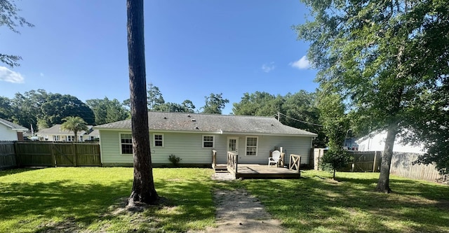 27 Pirates Cove Ln, Saint Marks, FL 32355 - back of house featuring a fenced backyard and a wooden deck