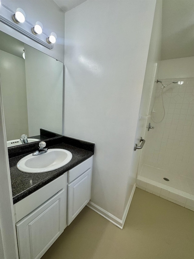 27 Pirates Cove Ln, Saint Marks, FL 32355 - bathroom with a tile shower and vanity
