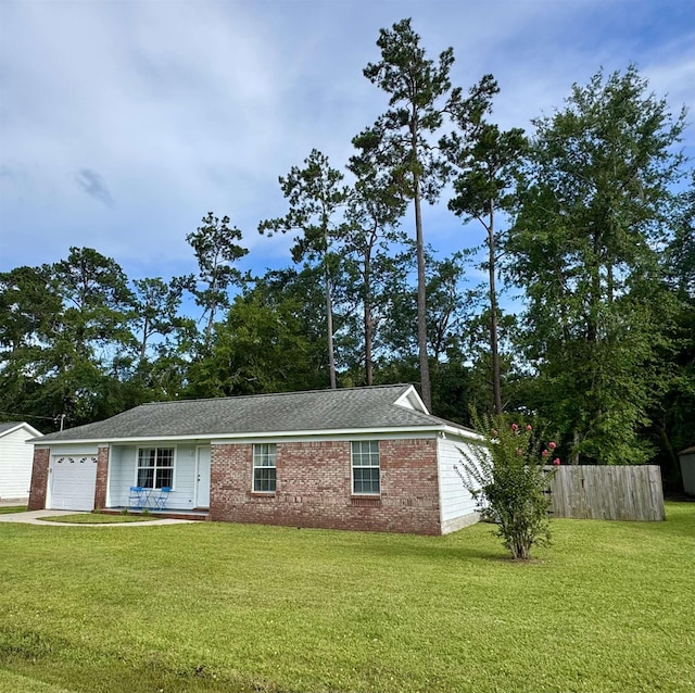 27 Pirates Cove Ln, Saint Marks, FL 32355 - view of front of house with an attached garage