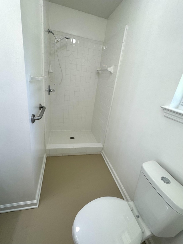 27 Pirates Cove Ln, Saint Marks, FL 32355 - bathroom featuring toilet and a tile shower