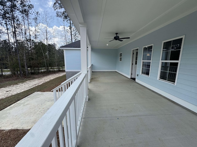 view of patio featuring a ceiling fan