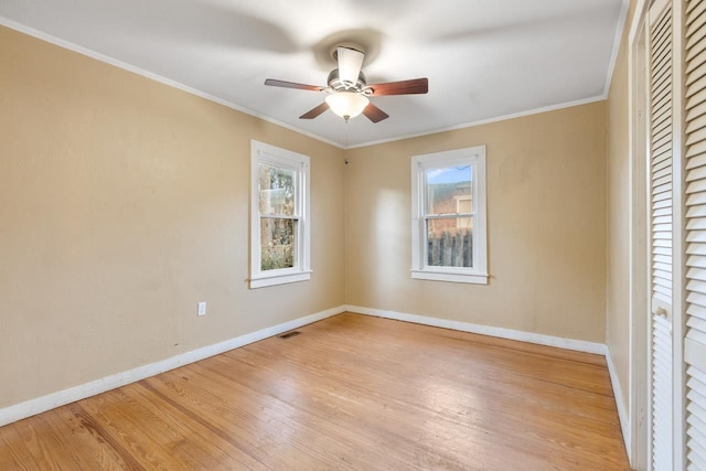 450 W Dogwood St, Monticello, FL 32344 - empty room with light wood-style floors, visible vents, ornamental molding, and baseboards