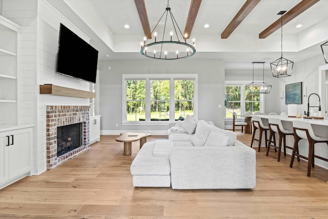 1020 Baum Rd, Tallahassee, FL 32317 - living room with a chandelier, beam ceiling, light wood-type flooring, recessed lighting, and healthy amount of natural light