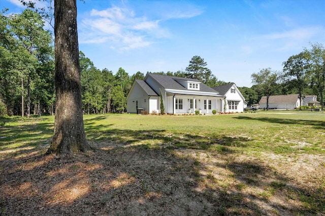 1020 Baum Rd, Tallahassee, FL 32317 - modern inspired farmhouse with a front yard and a porch