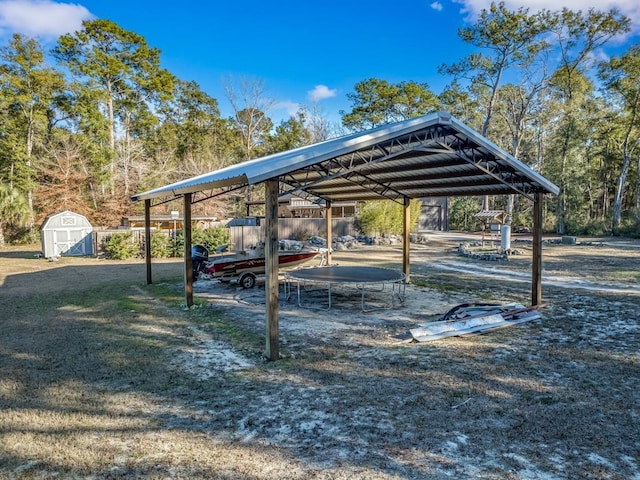 view of vehicle parking featuring a carport