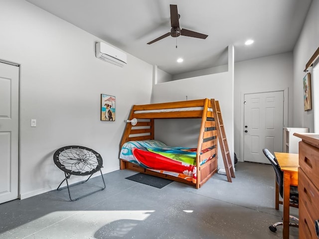 bedroom with an AC wall unit, ceiling fan, and concrete floors