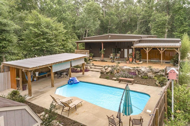 view of pool featuring a patio area