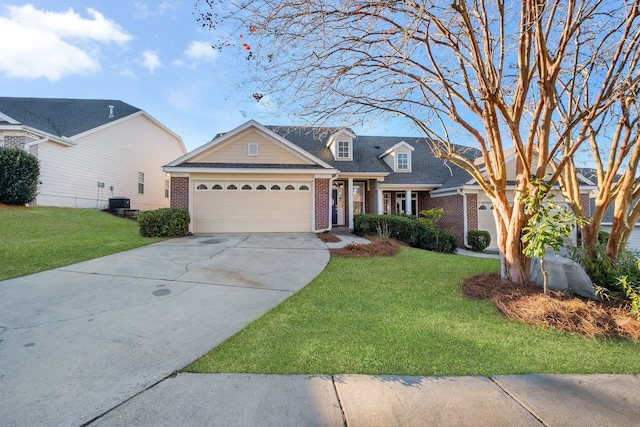 view of front facade with central AC, a front lawn, and a garage