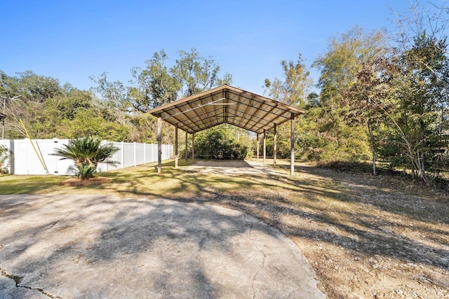 view of vehicle parking featuring a carport