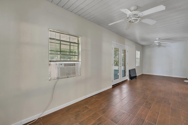 spare room with ceiling fan, dark wood-type flooring, cooling unit, french doors, and wood ceiling