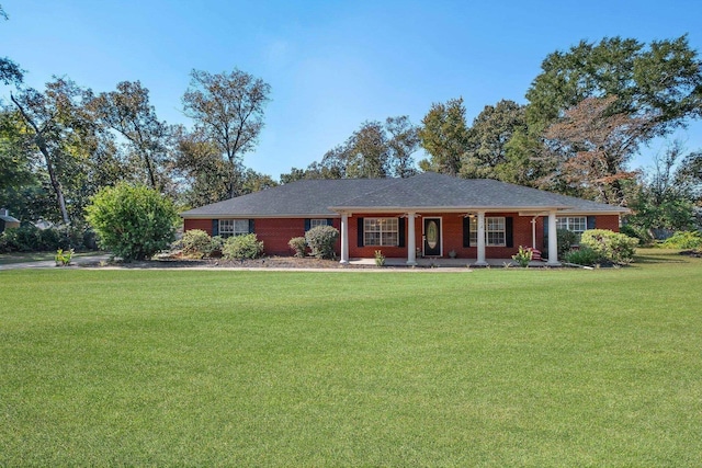 ranch-style house with a front lawn and a porch