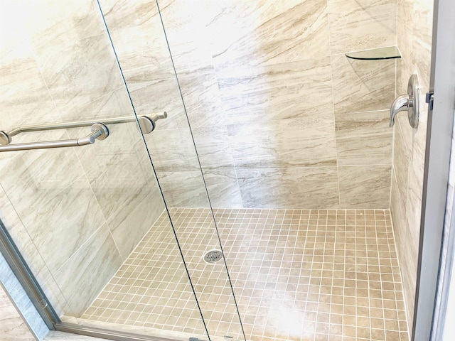 full bathroom with a shower stall