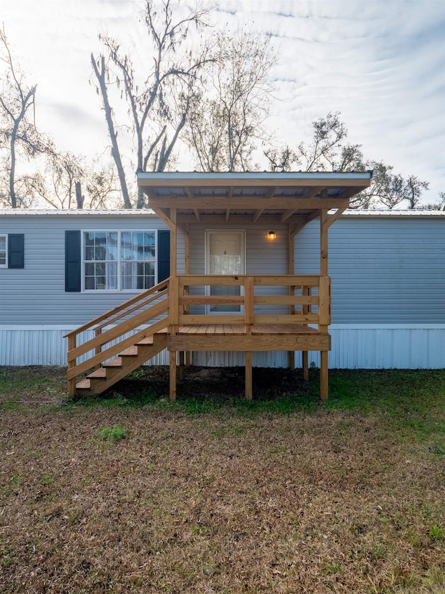 rear view of property with a deck