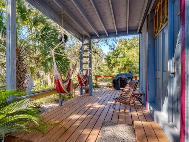 wooden terrace with grilling area