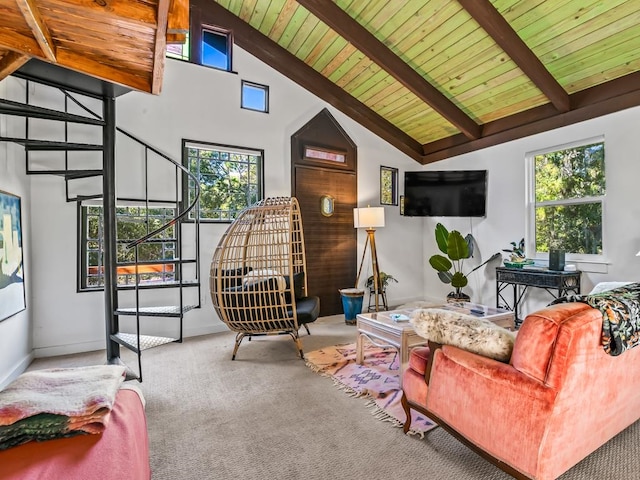 living room with plenty of natural light, beamed ceiling, wood ceiling, and high vaulted ceiling