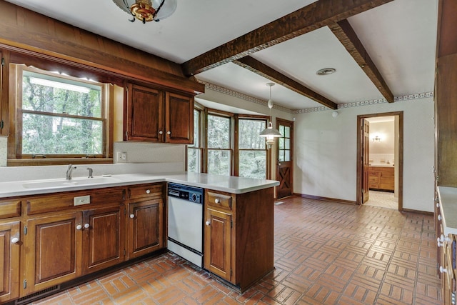 kitchen with decorative light fixtures, dishwasher, sink, kitchen peninsula, and beam ceiling