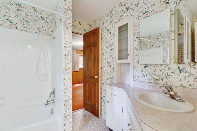 bathroom featuring vanity and shower / bath combination