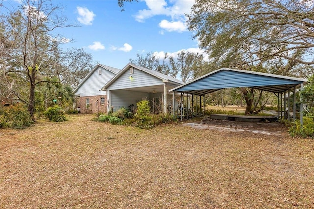 exterior space with a carport