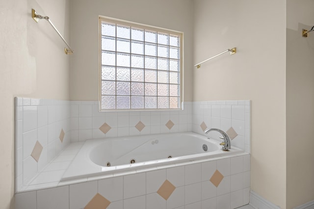 bathroom with tiled tub