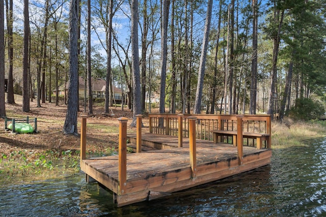 view of dock with a water view