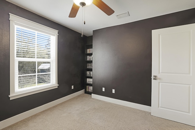 5286 Wild Goose Rd, Tallahassee, FL 32311 - unfurnished room with visible vents, baseboards, ceiling fan, and carpet floors