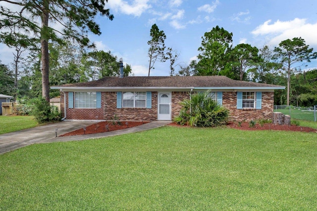 ranch-style home with a front yard