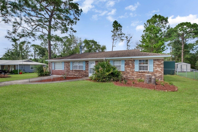 single story home with a front yard