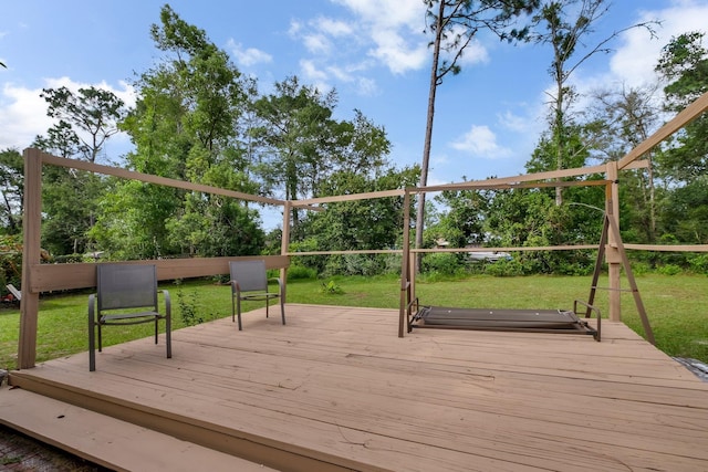 wooden terrace with a yard