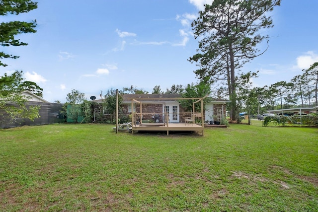 view of yard with a wooden deck