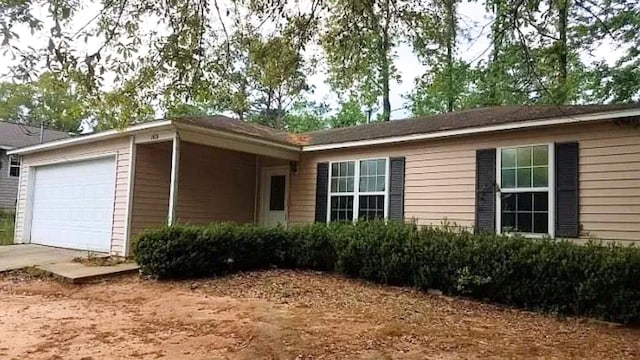 single story home with a garage