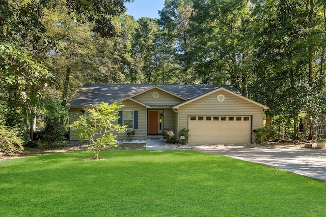 ranch-style house featuring a front lawn, driveway, and a garage
