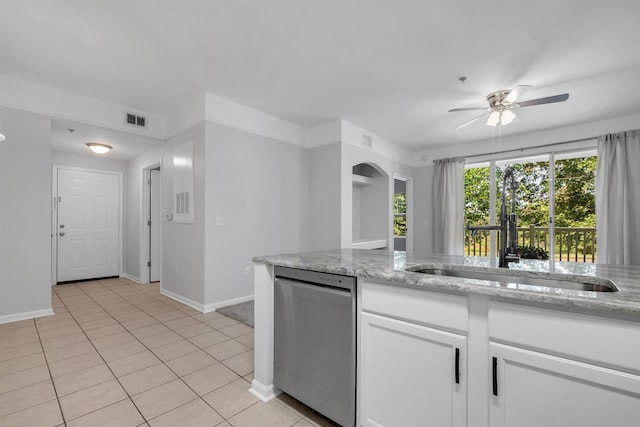2801 Chancellorsville Dr Unit 1218, Tallahassee, FL 32312 - kitchen with stainless steel dishwasher, a sink, arched walkways, a ceiling fan, and white cabinetry