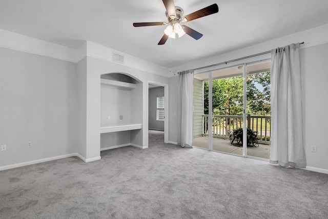 2801 Chancellorsville Dr Unit 1218, Tallahassee, FL 32312 - unfurnished bedroom with access to outside, carpet floors, baseboards, and a ceiling fan