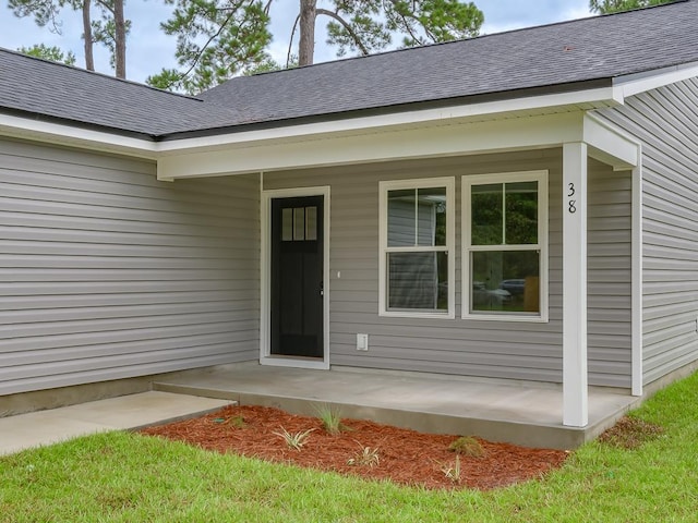 property entrance with a porch