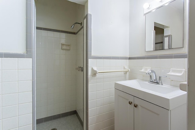 1318 W Tharpe St, Tallahassee, FL 32303 - full bathroom with a shower stall, tile walls, vanity, and a wainscoted wall