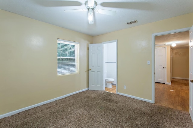 1318 W Tharpe St, Tallahassee, FL 32303 - unfurnished bedroom with carpet, baseboards, and ensuite bathroom