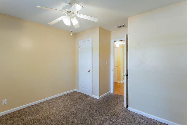 1318 W Tharpe St, Tallahassee, FL 32303 - unfurnished bedroom featuring carpet floors, baseboards, and a ceiling fan