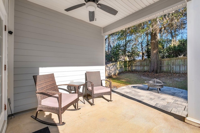 view of patio featuring ceiling fan