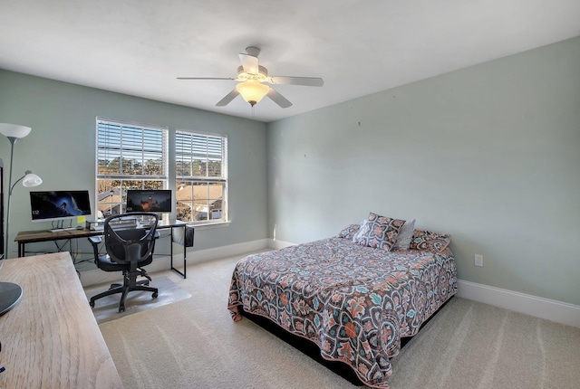 bedroom featuring ceiling fan and light colored carpet