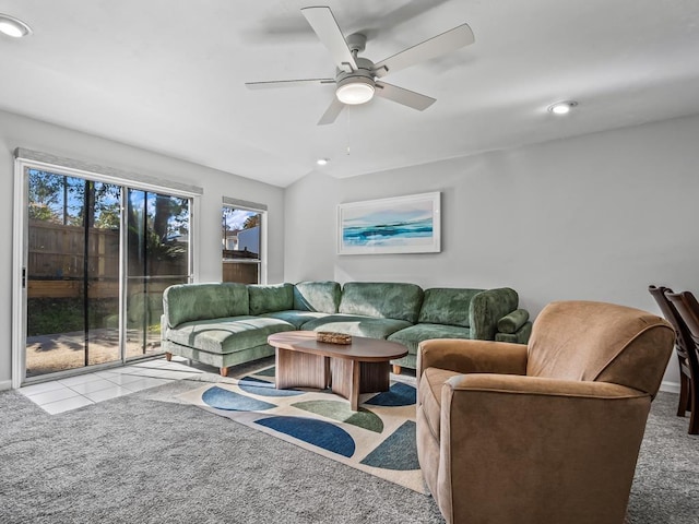 living room with light colored carpet and ceiling fan