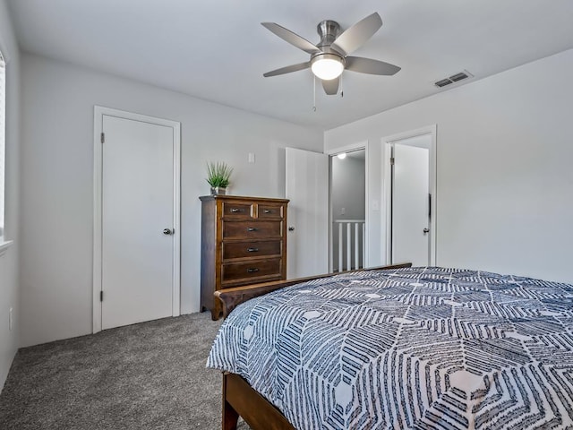 bedroom with ceiling fan and carpet floors