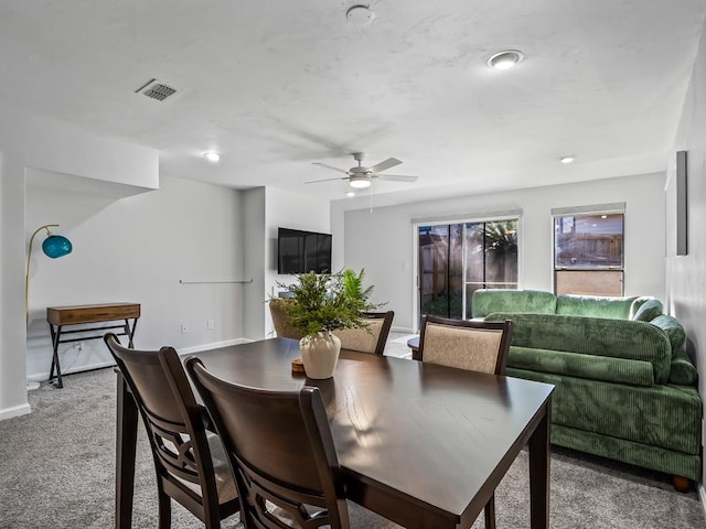 dining area with carpet