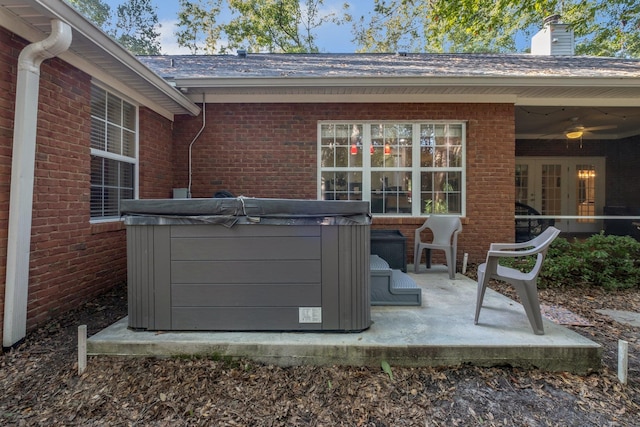 view of patio / terrace featuring a hot tub