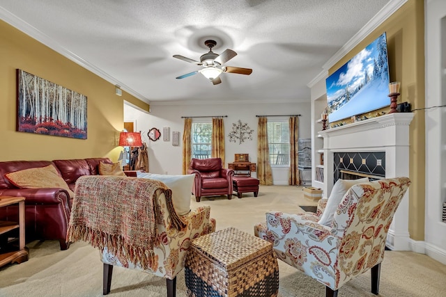 living room featuring ceiling fan, light colored carpet, a textured ceiling, and ornamental molding