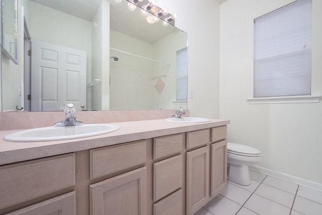 bathroom featuring a shower, tile patterned flooring, toilet, and vanity