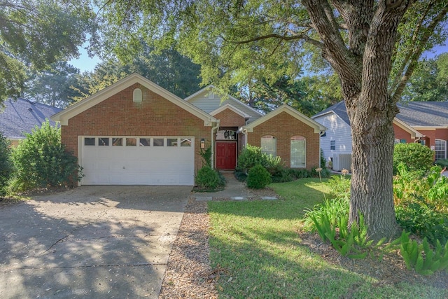 single story home with a front lawn and a garage