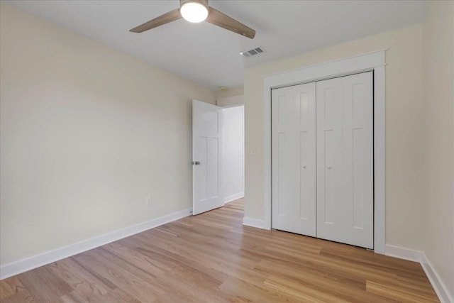 1602 Carruthers St, Tallahassee, FL 32308 - unfurnished bedroom with light wood finished floors, baseboards, a closet, and ceiling fan