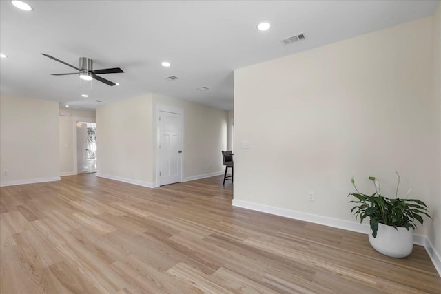 1602 Carruthers St, Tallahassee, FL 32308 - unfurnished living room with light wood-type flooring, recessed lighting, ceiling fan, and baseboards