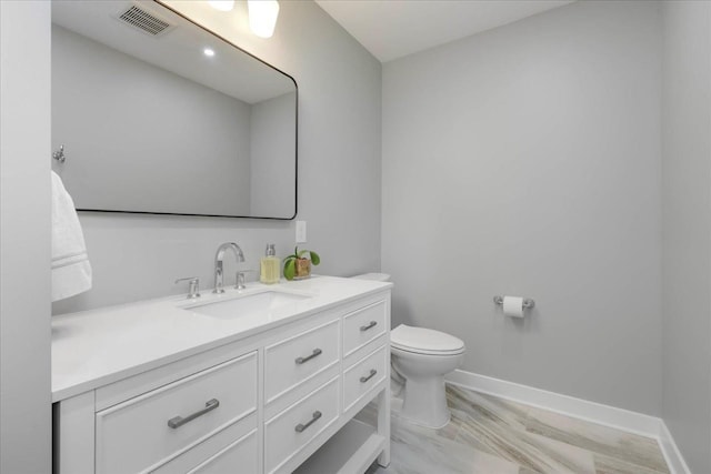 1602 Carruthers St, Tallahassee, FL 32308 - bathroom with vanity, toilet, and baseboards